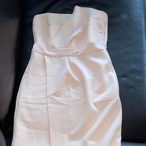 One strapless blush colored dress